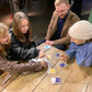 Group of students play cards